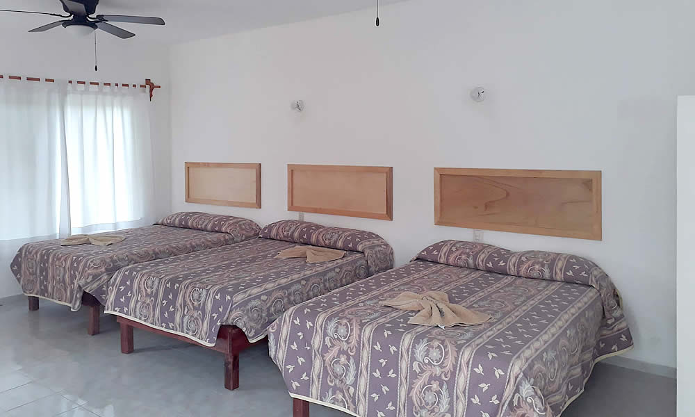 Habitación Triple con Cocineta
